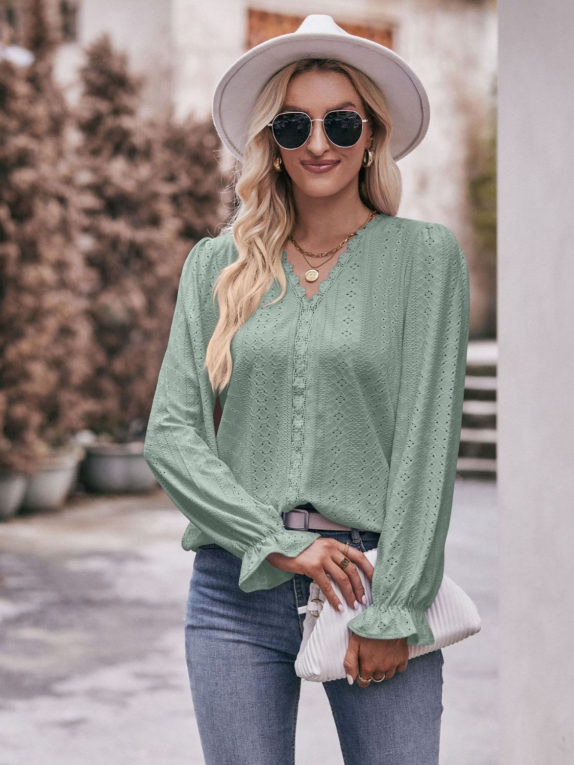 Bohemian Exposed Seam Round Neck Long Sleeve Cropped Top
