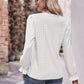 Bohemian Exposed Seam Round Neck Long Sleeve Cropped Top