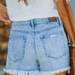 Mid Waist Buttoned Front Ripped Light Denim Shorts