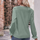 Bohemian Exposed Seam Round Neck Long Sleeve Cropped Top
